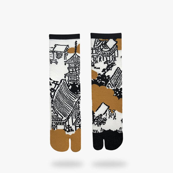 Une paire de chaussette traditionnelle japonaise représentant un dessin d'estampe japonaise avec des maisons