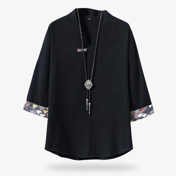 Ce habit ample est un Tee-Shirt Japonais Traditionnel de couleur noir avec des motifs Kumo sur les deux extremités des manches en coton