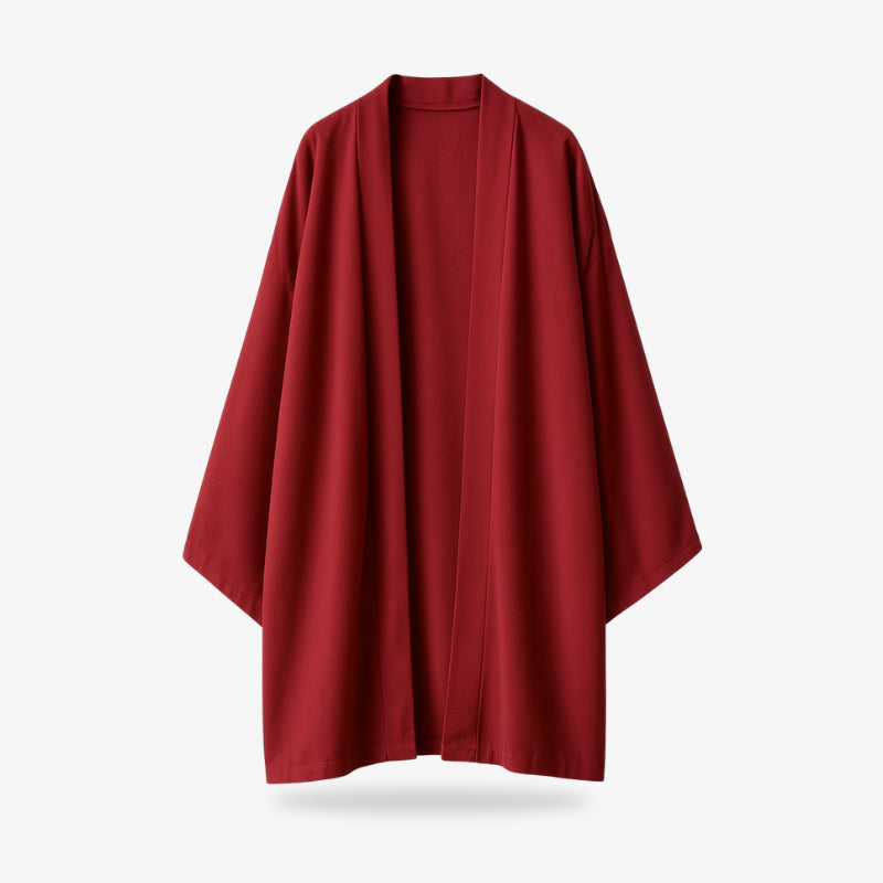 Un blazer kimono japonais rouge sur fond blanc