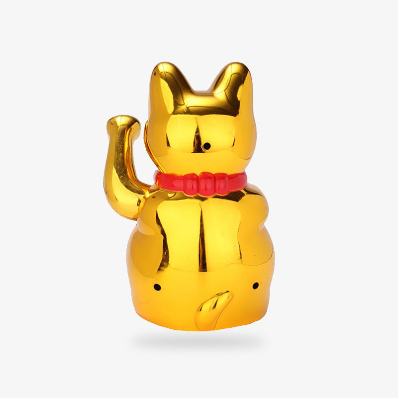 Le maneki neko or est une statuette de chat japonais qu'on place sur une étagère ou sur un bureau. C est talisman en forme de chat qui attire la richesse