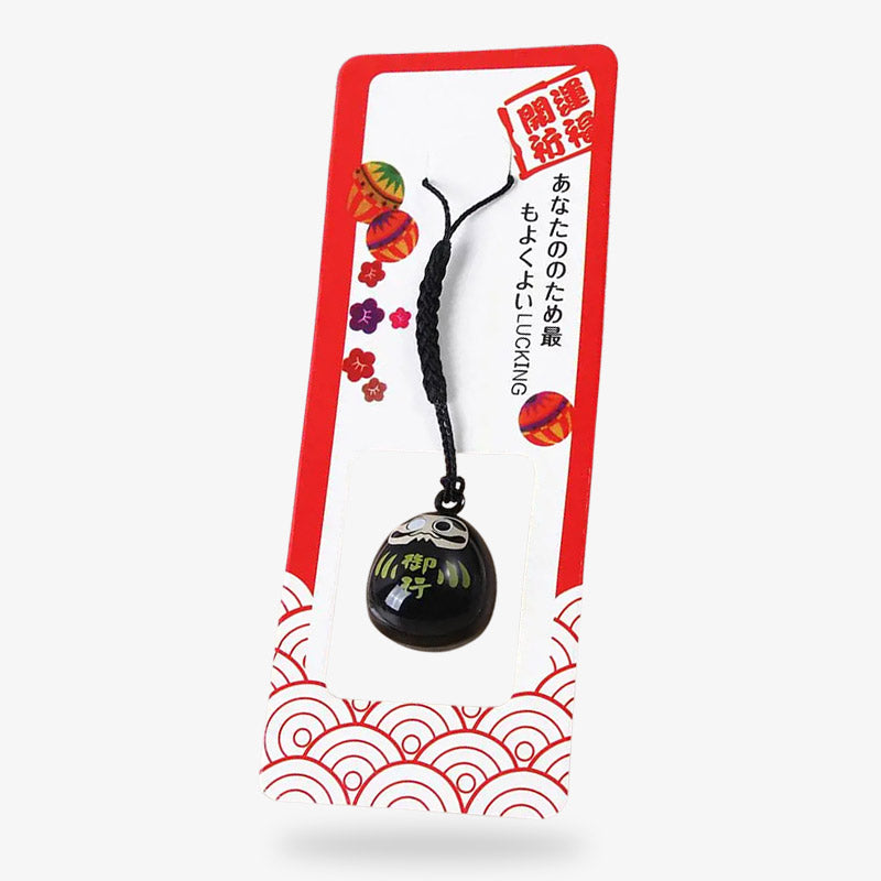 Porte-clé Daruma japonais aux motifs traditionnels symbolisant la chance et la persévérance