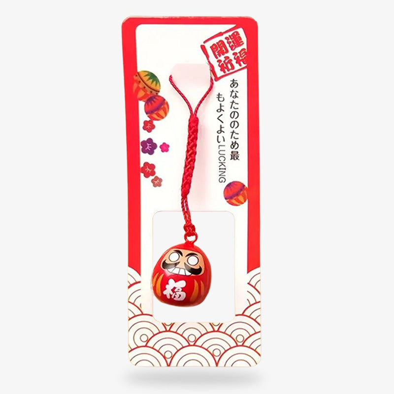 Porte-clés japonais aux motifs traditionnels de daruma, symbolisant chance et persévérance pour atteindre ses objectifs