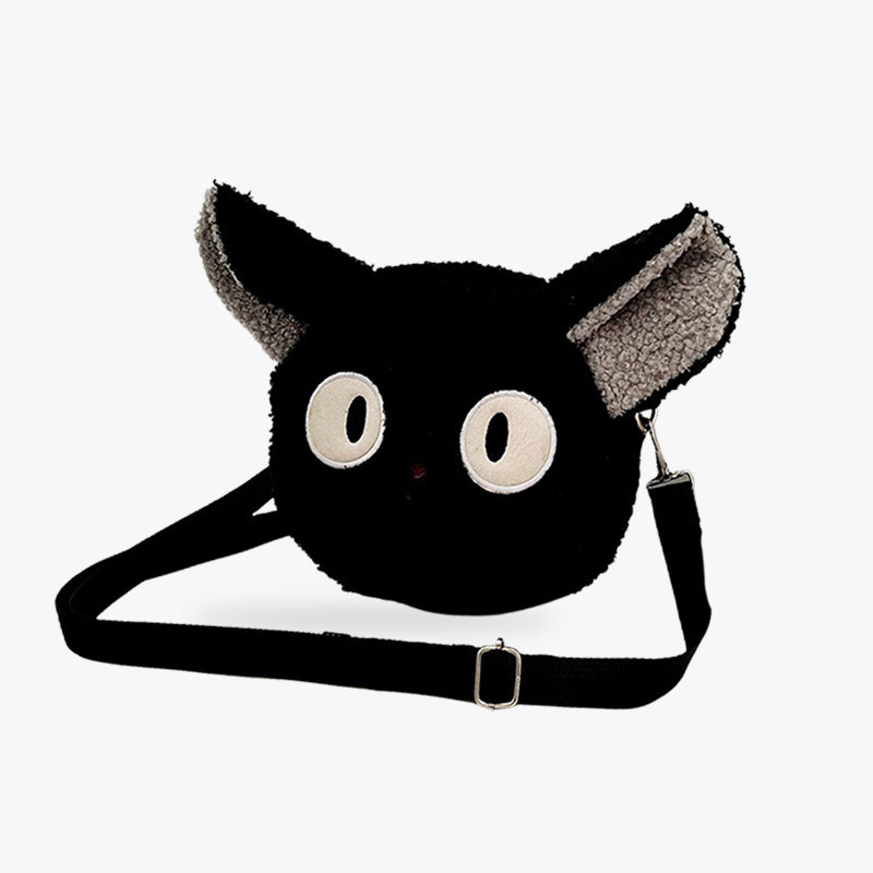 Ce sac kawaii est de couleur noir et a la forme d'une tete de chat mignonne. La matière du sac japonais est douce et moletonnée comme une peluche