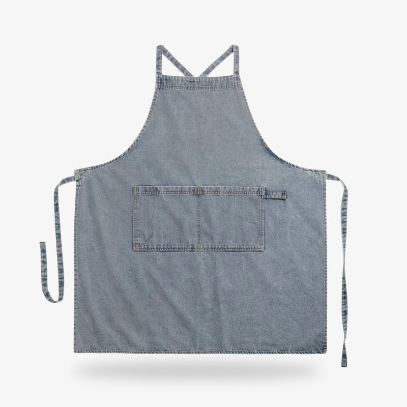 Tablier de cuisine japonais en denim de haute qualité, conçu avec des bretelles croisées et une poche avant fonctionnelle.