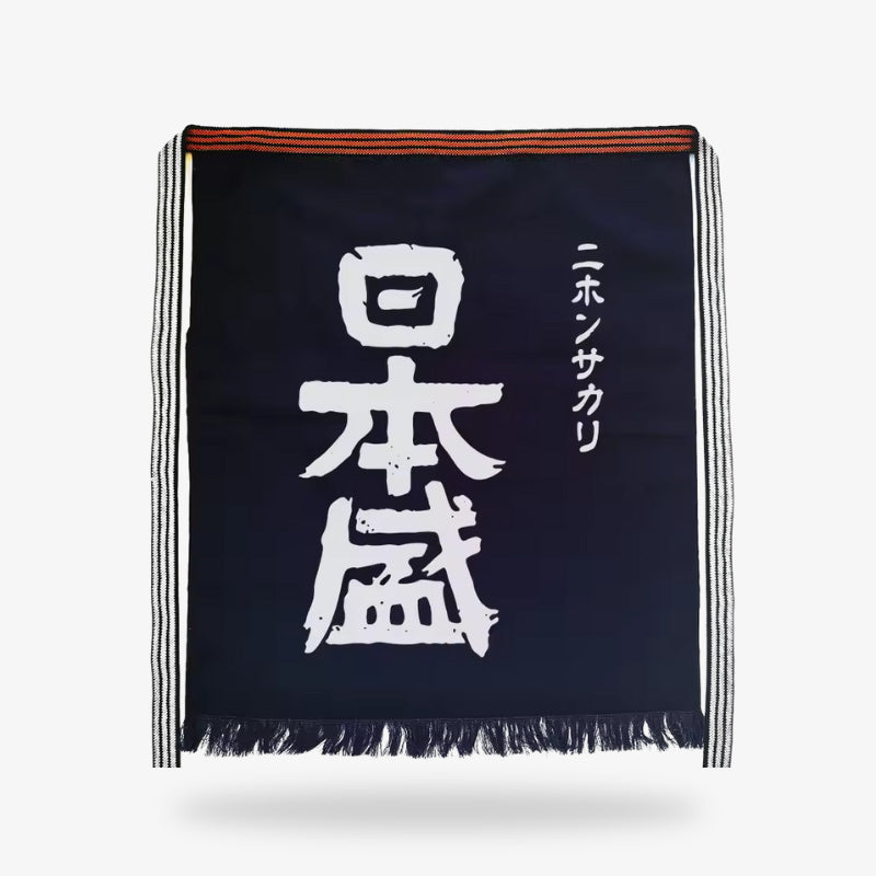 Tablier japonais Maekake pour la cuisine washoku, en coton épais et décoré d'un kanji classique, entre tradition et fonctionnalité