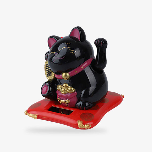 LE chat japonaise maneki neko noir a la patte gauche levée