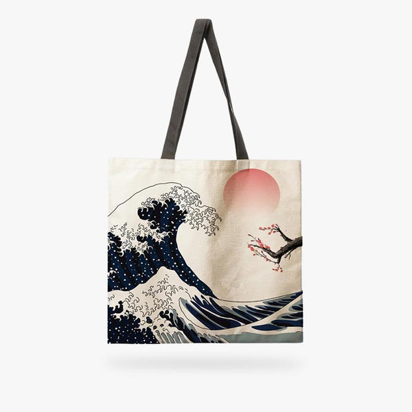 Ce sac fourre tout est un tote bag japonais en lin. Le sac a le symbole de la grande vague de kanagawa de l'artiste Hokusai