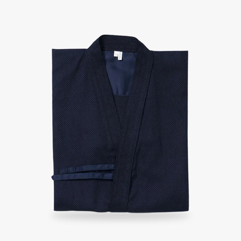 L'Aikido kimono est un uniforme traditionnel, parfait pour les pratiquants d'aikido recherchant confort et durabilité.