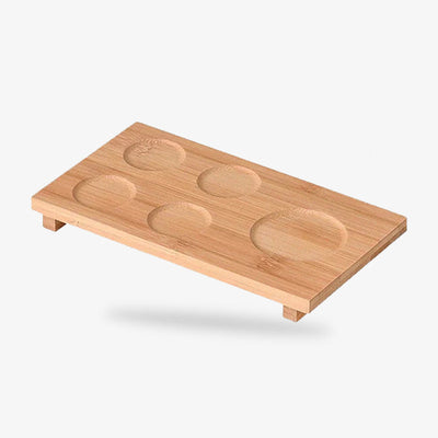 Assiette à saké japonaise assortie pour accompagner le service en céramique