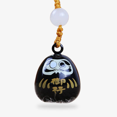 Breloque Daruma, charme japonais classique associé à la persévérance et à la chance