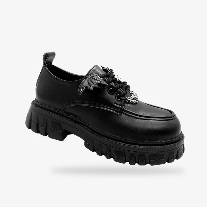 Chaussures Lolita noires au design inspiré du Japon, mêlant styles gothique et Lolita pour une allure élégante et unique