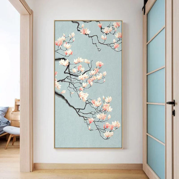 Dans un appartement un grand tableau cerisier fleur japon est accroché sur un mur