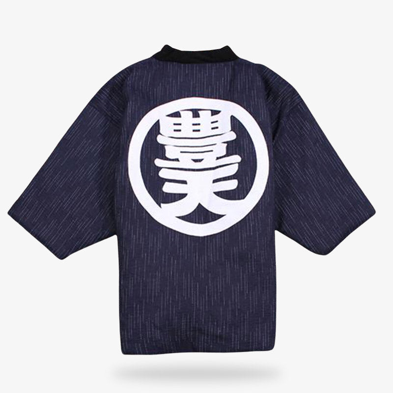 un manteau hanten avec un kanji blanc imprimé dans le dos du tissu bleu et molletonné