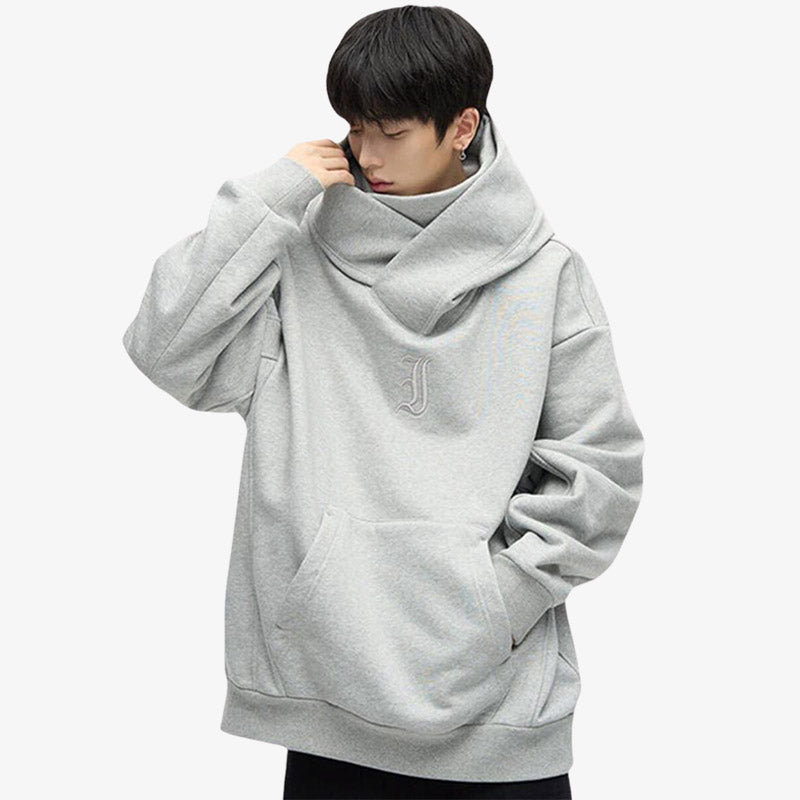 Hoodie style japon avec une coupe sobre et élégante, conçu en coton gris premium pour un confort optimal.