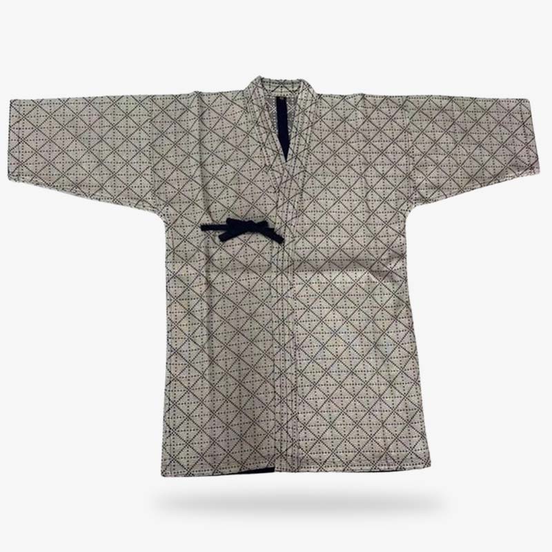 Ce vêtement japonais style nippon est un keikogi japonais. Le tissus est imprimé et brodé avec un motif japonais géométrique