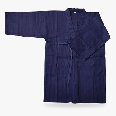 Le Kimono aikido homme offre une coupe traditionnelle et un confort exceptionnel pour les pratiquants d'aikido.