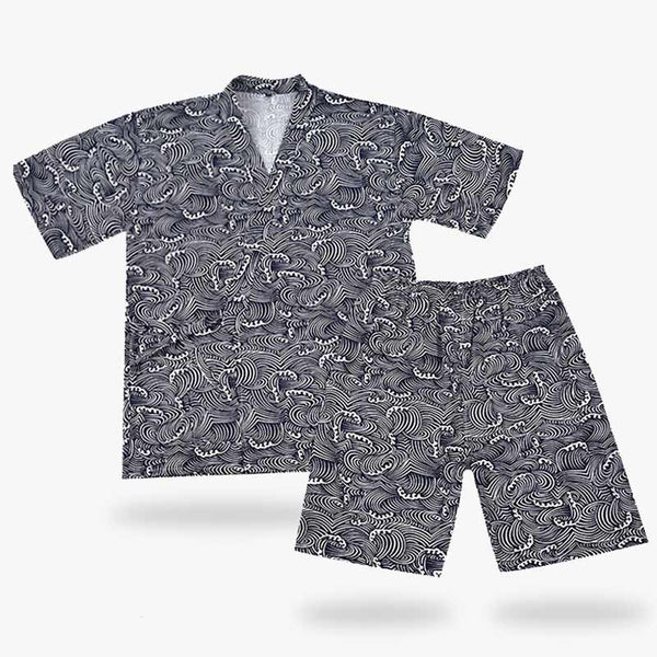 Le kimono jinbei est un haut de pyjamam japonais et un short. Les motifs imprimés sur le tissu en coton sont inspirés des symboles de vague japonaise. C'est un habit japonais traditionnel qui se porte en été