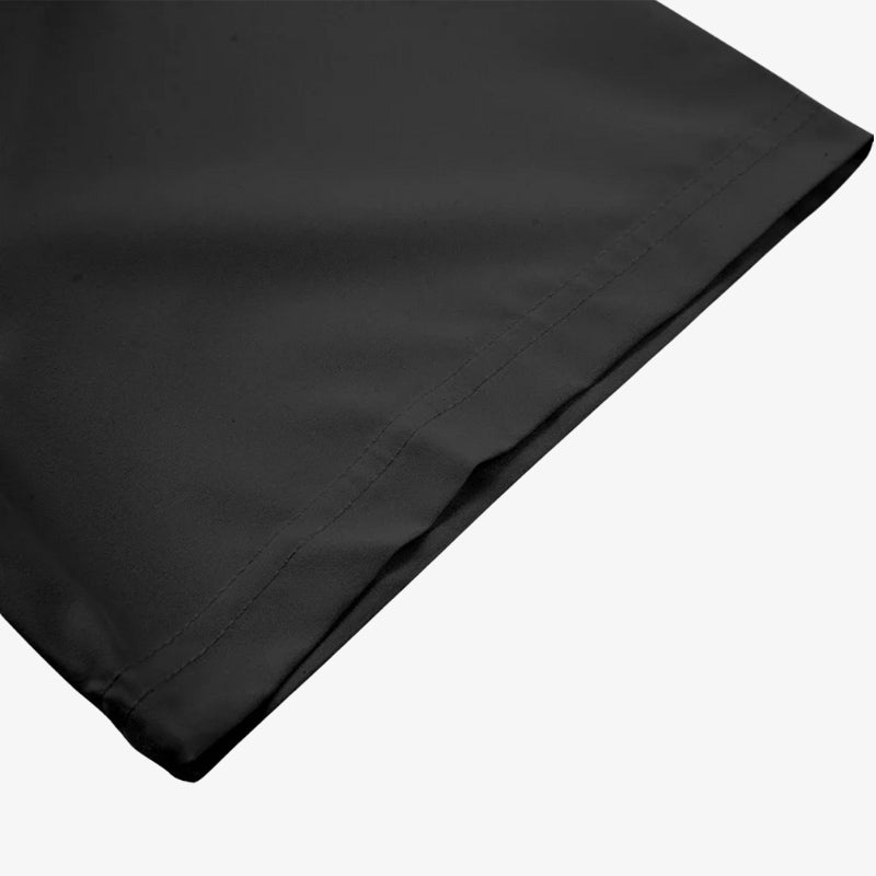 Une manche de kimono noire réalisée en coton et polyester