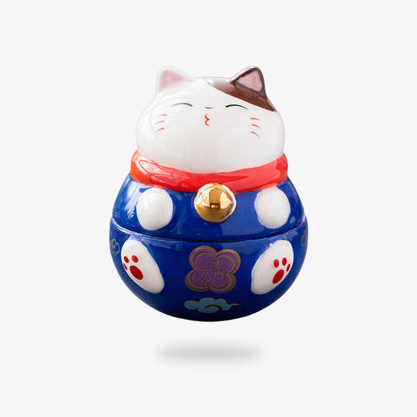 Ce chat maneki neko decoration est en ceramique. C'est un objet japonais porte bonheur