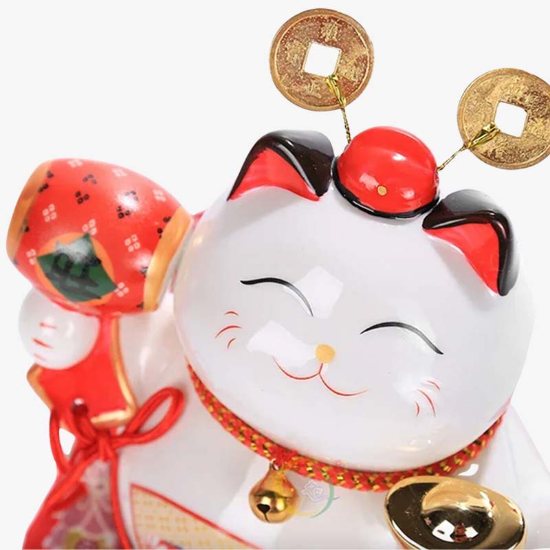 CE chat japonais porte-bonheur est un maneki neko lucky cat for sale. Ce chat japonais est fabriqué en céramique