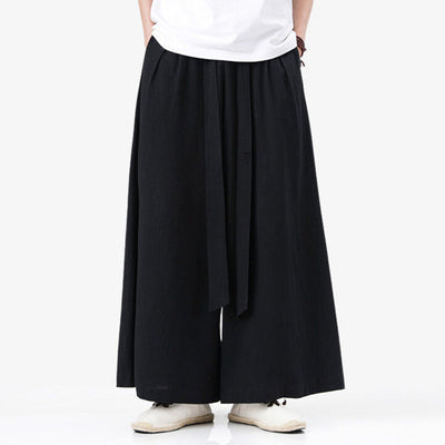 Pantalon japonais traditionnel noir de style hakama, tombé fluide et allure zen