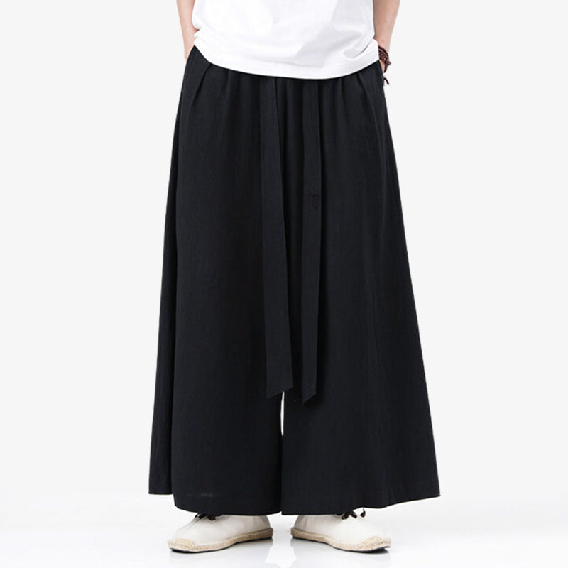 Pantalon japonais traditionnel noir de style hakama, tombé fluide et allure zen