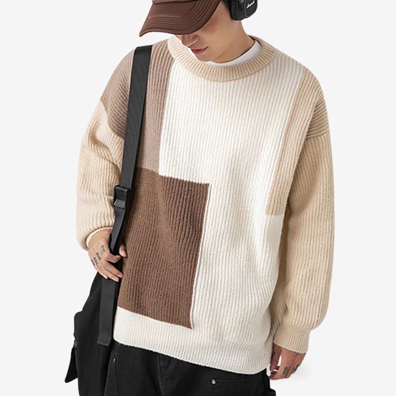 Ce Pull homme japonais tricolore au design minimaliste, fabriqué en coton et cachemire, idéal pour un look inspiré de la culture japonaise.