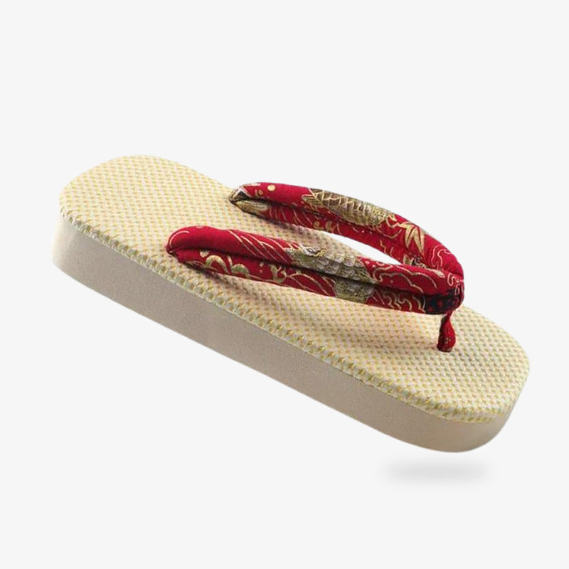 Sandales zōri légères aux lanières rouges ornées d'un motif japonais, idéales pour la plage et les journées d'été