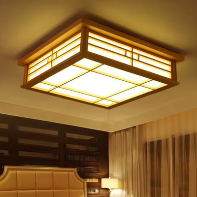 Plafonnier bois noyer de style japonais dans une pièce Japandi à l'éclairage chaleureux