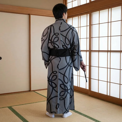 Détail du tissu du kimono homme gris