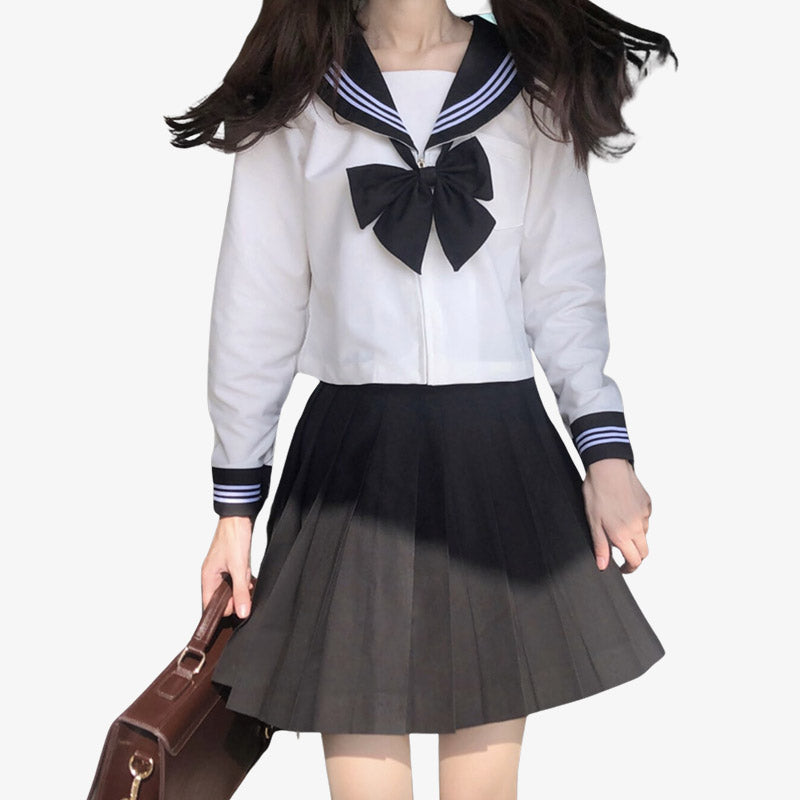 Uniforme scolaire japonais fille avec le style sailor fuku, un ensemble classique composé d’une blouse à col marin, d’une jupe et d’un ruban.