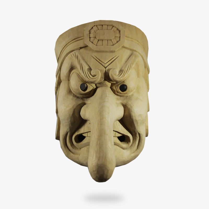 Ce masque Tengu Theatre japonais est un visage d'homme aux sourcils froncé et au long nez