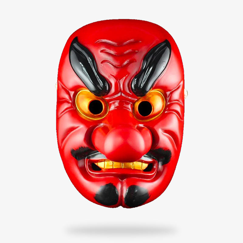 Ce masque tengu rouge symbolise le visage d'un homme avec les sourcils froncés et un long nez