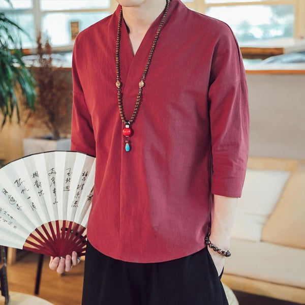Ce vêtement zen du Japon est un T-shirt en lin homme. Il porte un éventail et un collier perle