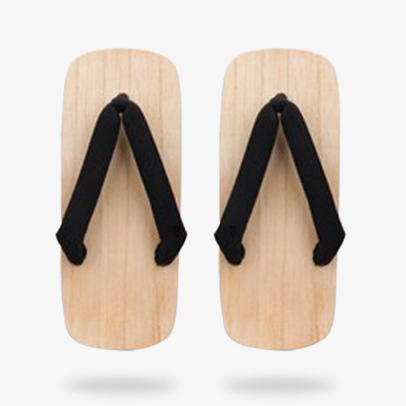 Sandale Geta japonaise en bois brut vue de côté