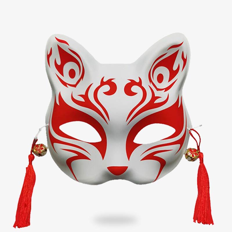 Le masque japonais chat est peint à la main avec des motifs rouges