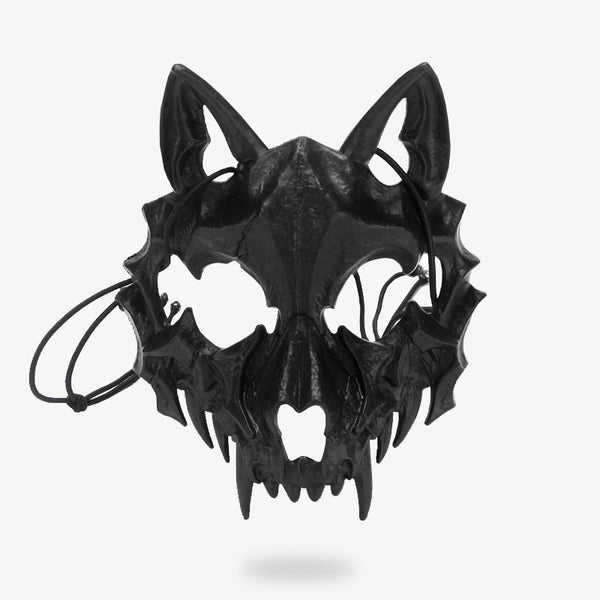 Le masque japonais renard signification du démon Kitsune. Le masque est noir et en forme de squelette