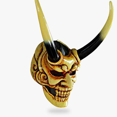 ce masque japonais vert est un démon Oni du folklore shinto. Il a des cornes