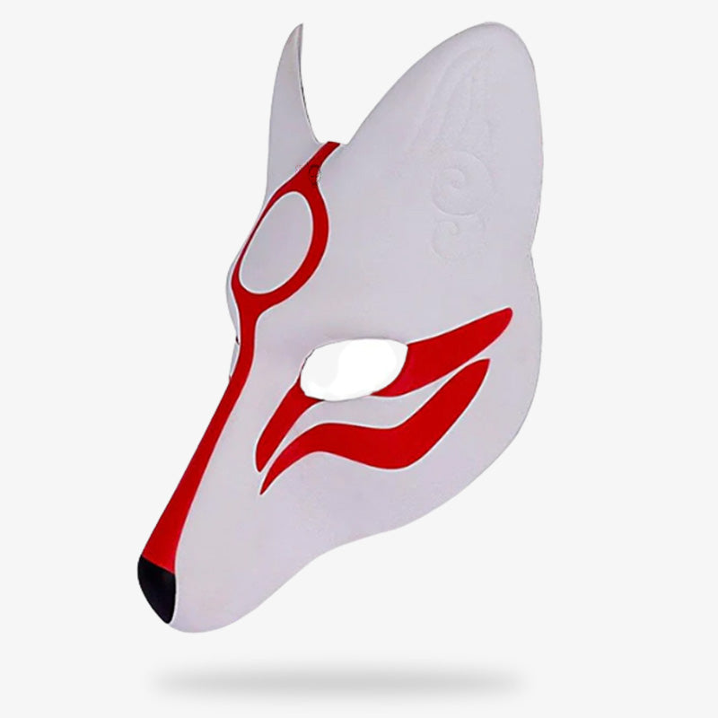 Ce masque renard kitsune est de couleur de peinture rouge et blanc