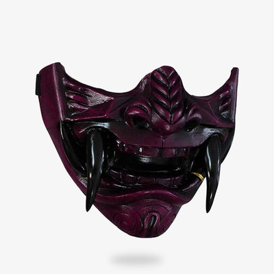 Ce masque traditionnel Japon est un demi-visage de démon Oni. Masque peint à la main